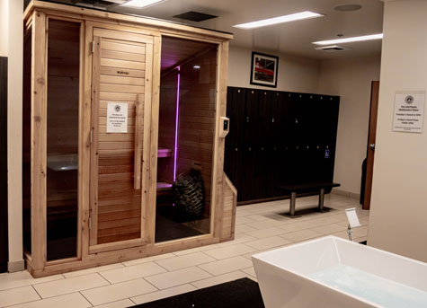 Manhattan Beach recovery sauna and locker room with cold plunge tub